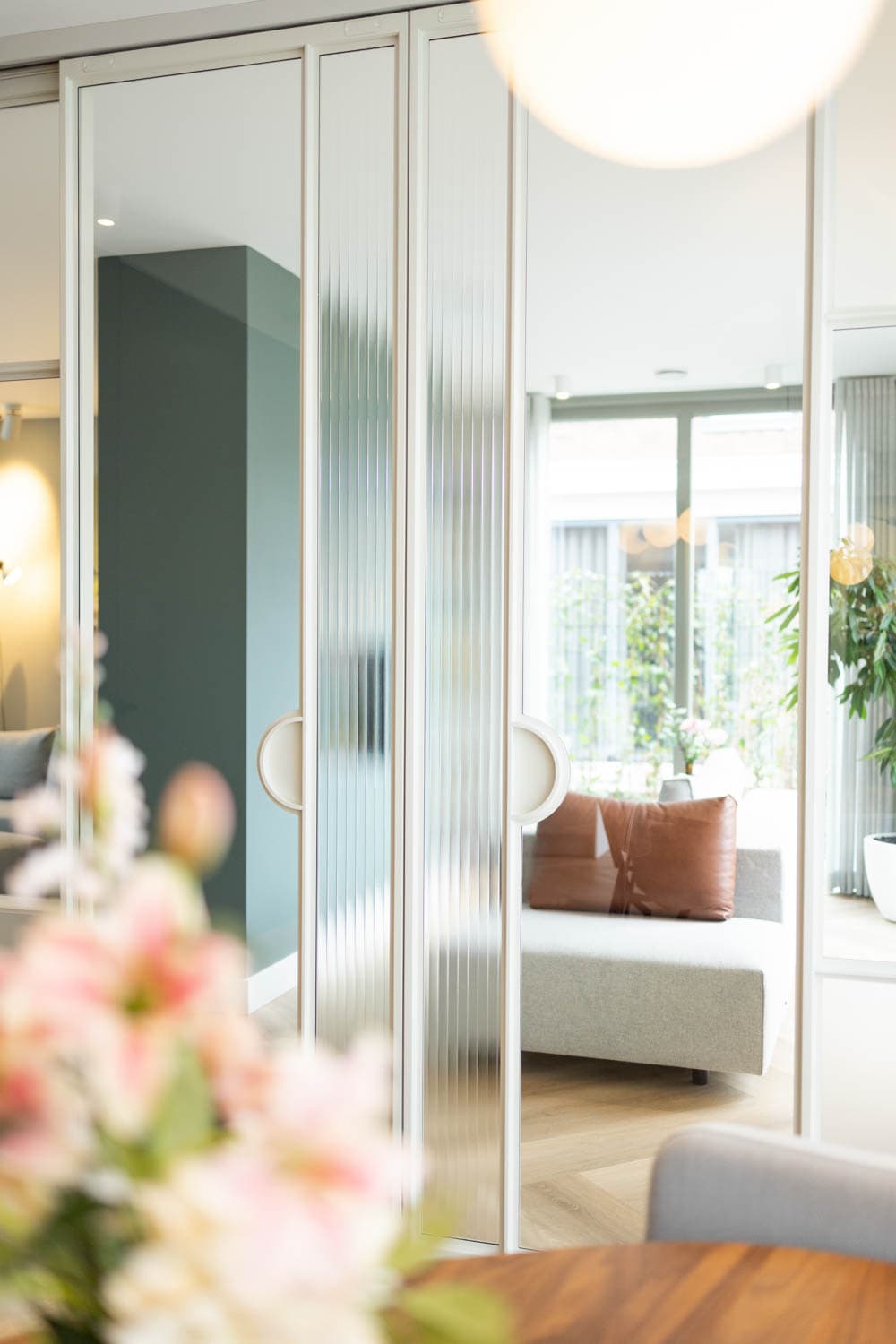 white steel glazed sliding doors used as a room divider in a high end private residence