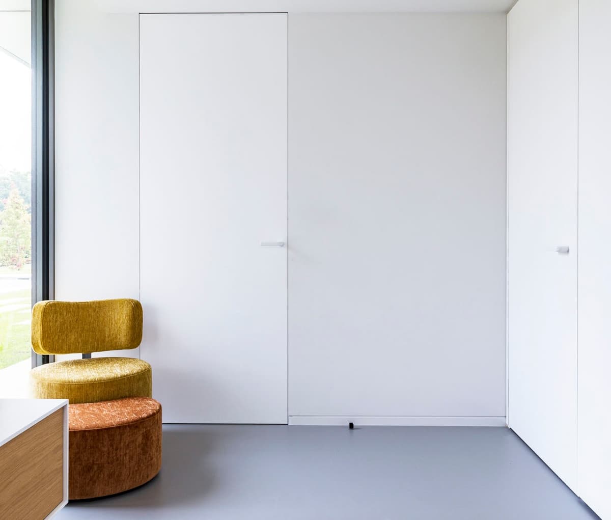 flush invisible door in a minimalist interior