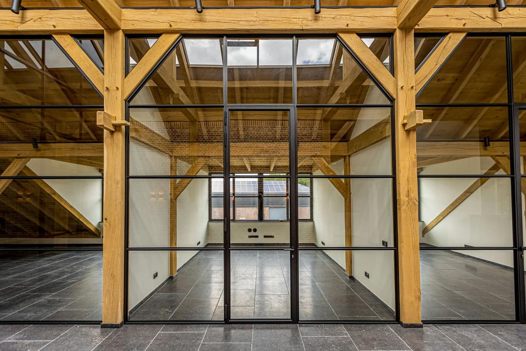 hinged fire-rated steel glazed doors in an office